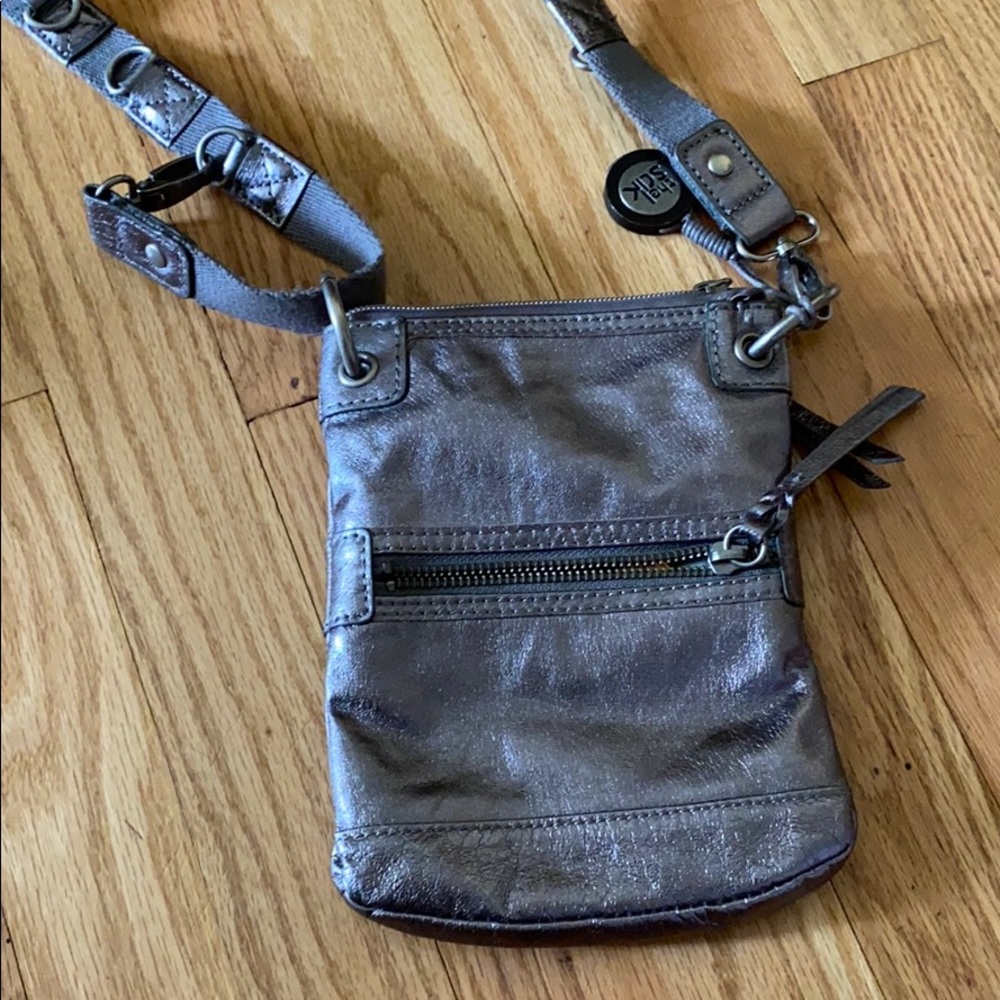 The Sak shiny silver crossbody purse